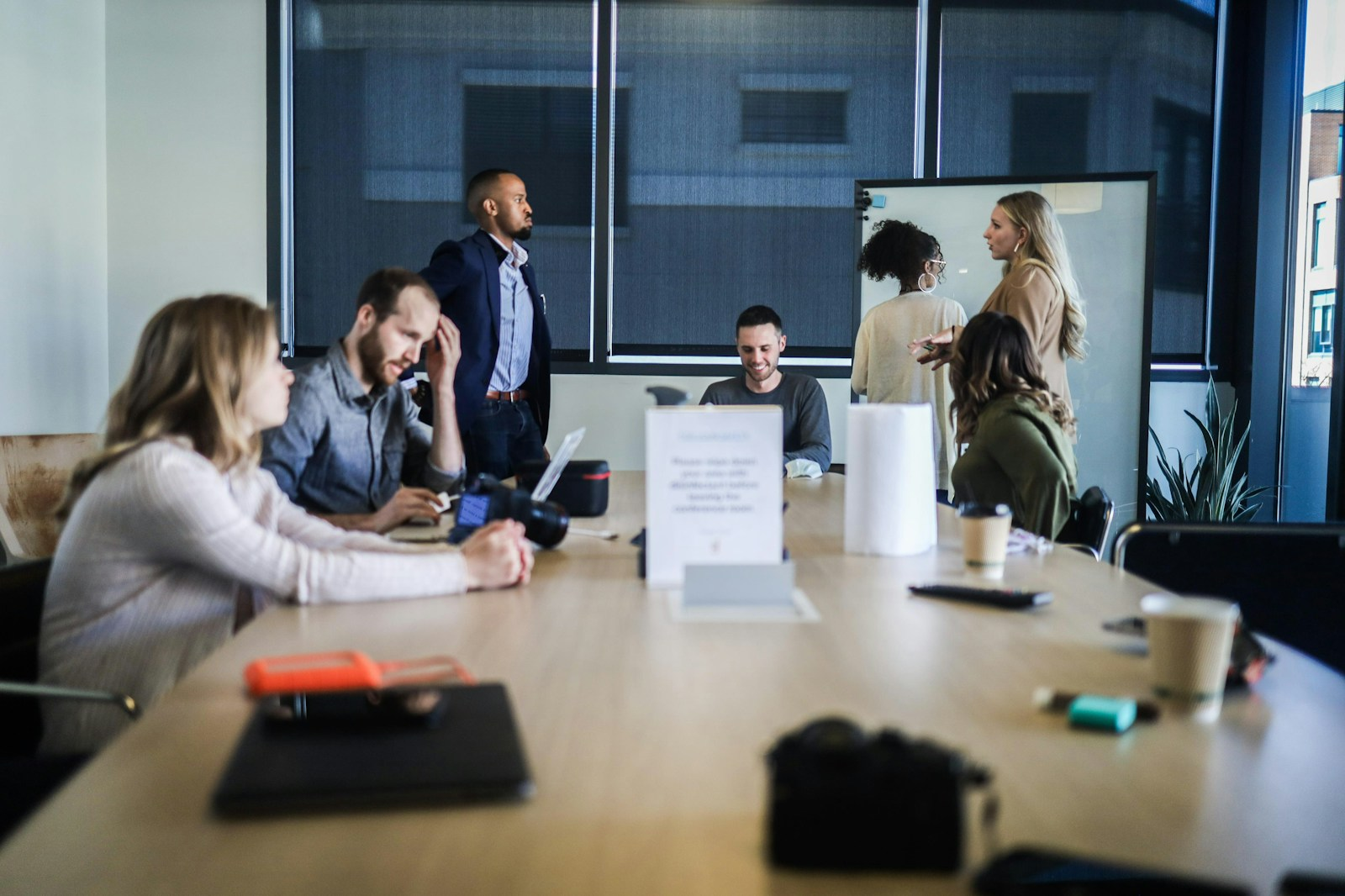 Finance professionals collaborating around a table