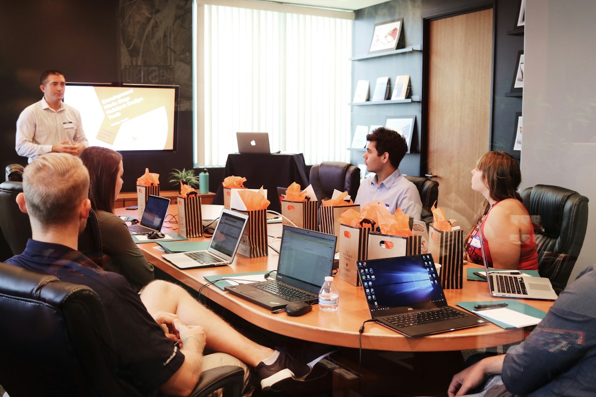 A marketing team reviewing campaign performance in a workshop