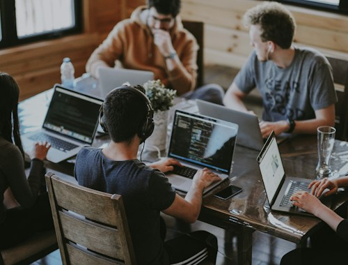 Engineers collaborating on technical backlog